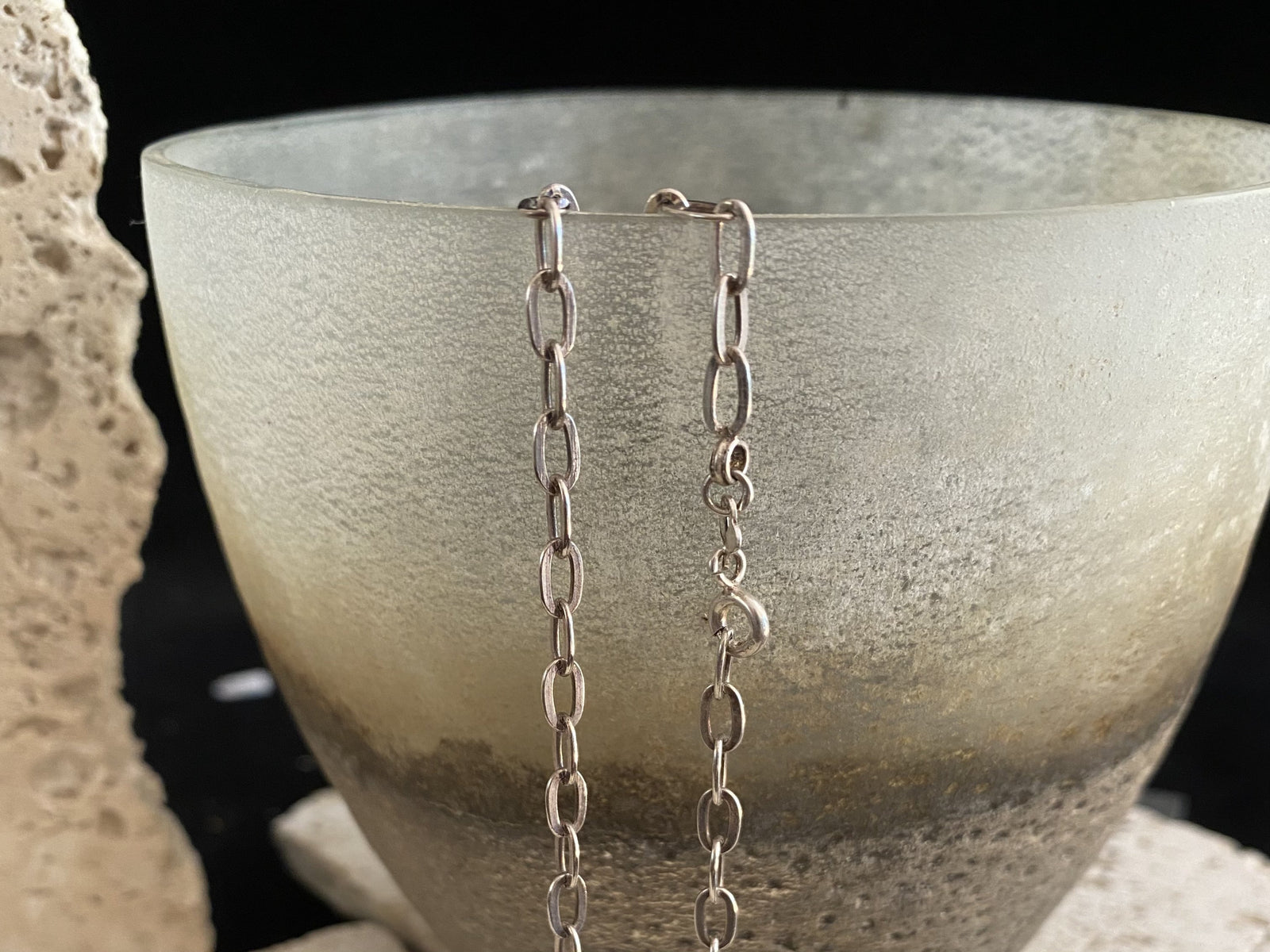 Elegant, open link chain featuring flat, oval links. Crafted from sterling silver and finished with a ring clasp.  Length 80 cm/31.5"