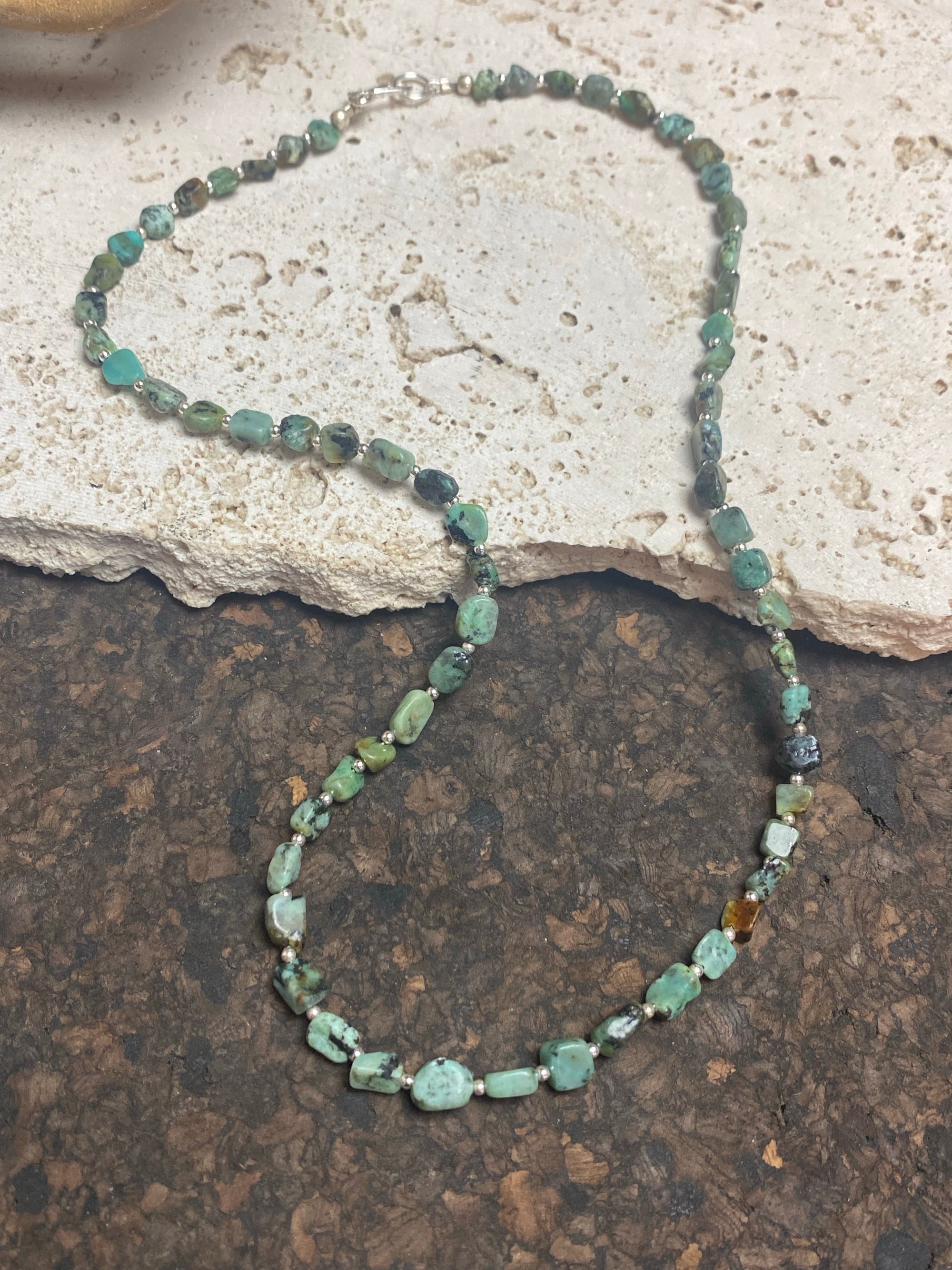 African turquoise boulder necklace with sterling silver bead highlighting