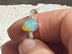 Opal ring set in heavy sterling silver. A stunning, high quality stone with excellent fire. Size 7.75