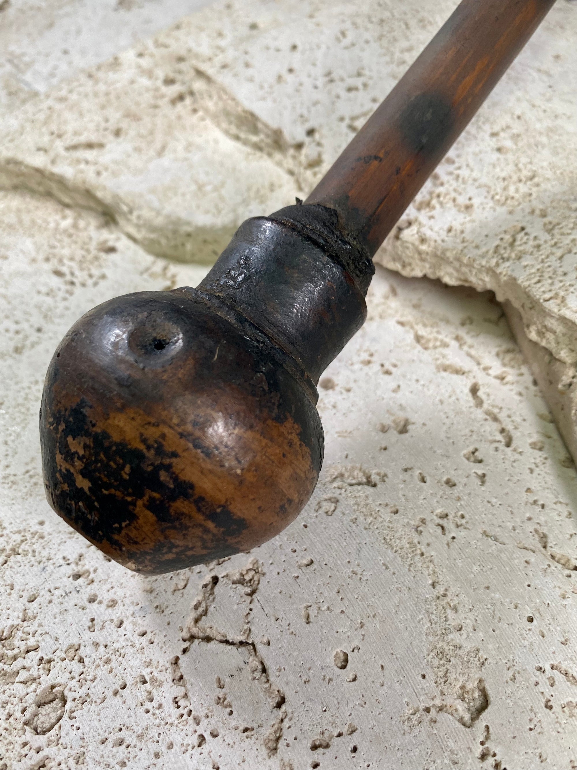 A typical village opium pipe, used by a number of hill tribe people within the Golden Triangle of southeast Asia. This is most likely Hmong.  Bamboo shaft, earthenware smoking bowl. Metal tool used to apply opium is original to the pipe. Early 20th century. In good condition with no cracks or repairs.  Total length 36 cm (14.25")