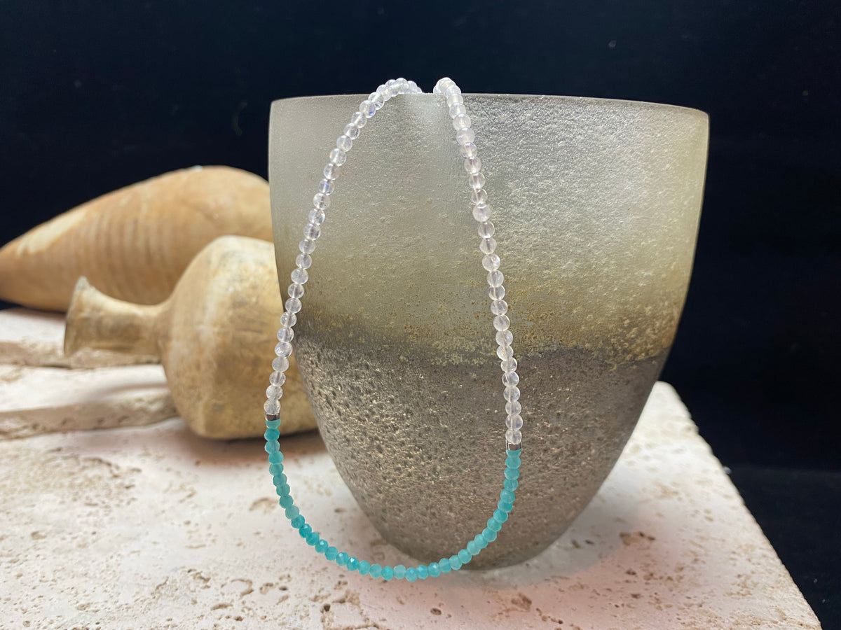Our simple and bright choker necklace is made from rainbow moonstone and faceted amazonite beads, highlighted with sterling silver beads and a finished with a sterling silver mount and bail. Measurements: length 41 cm (16.25 in), bead diameter 2 mm