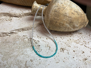 Our simple and bright choker necklace is made from rainbow moonstone and faceted amazonite beads, highlighted with sterling silver beads and a finished with a sterling silver mount and bail. Measurements: length 41 cm (16.25 in), bead diameter 2 mm