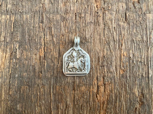 Antique silver amulets that represent Baba Ramdev (Ramdevshi), a legendary Rajput warrior who went about doing deeds of goodness and valour. These small pendants are traditionally worn for protection and good luck and date from the early 19th - early 20th century.  Measurements: all vary between 1.5 and 1.7 cm in width