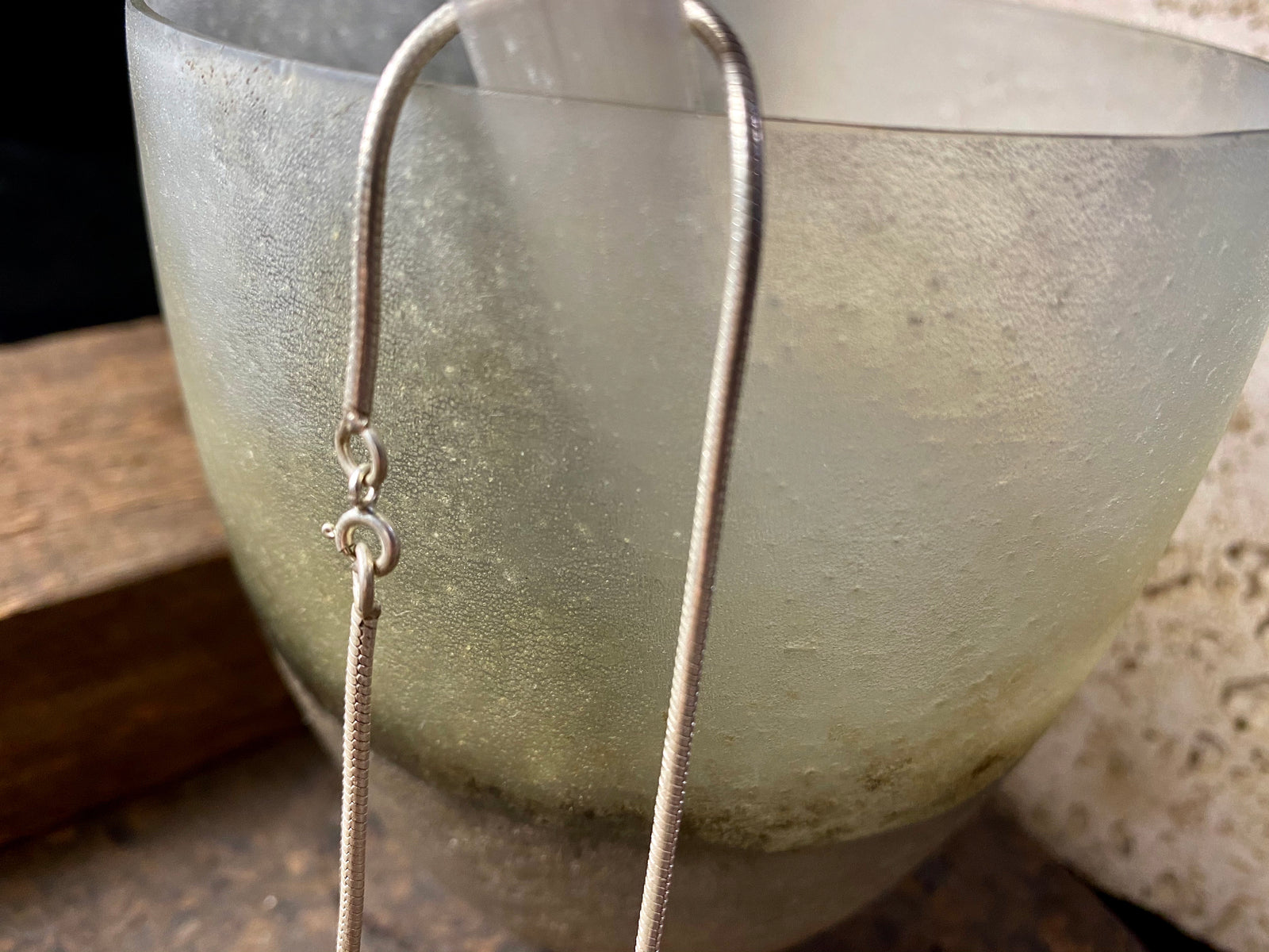 fine sterling silver snake chain is densely woven and strong, with a bright silver finish and ring clasp