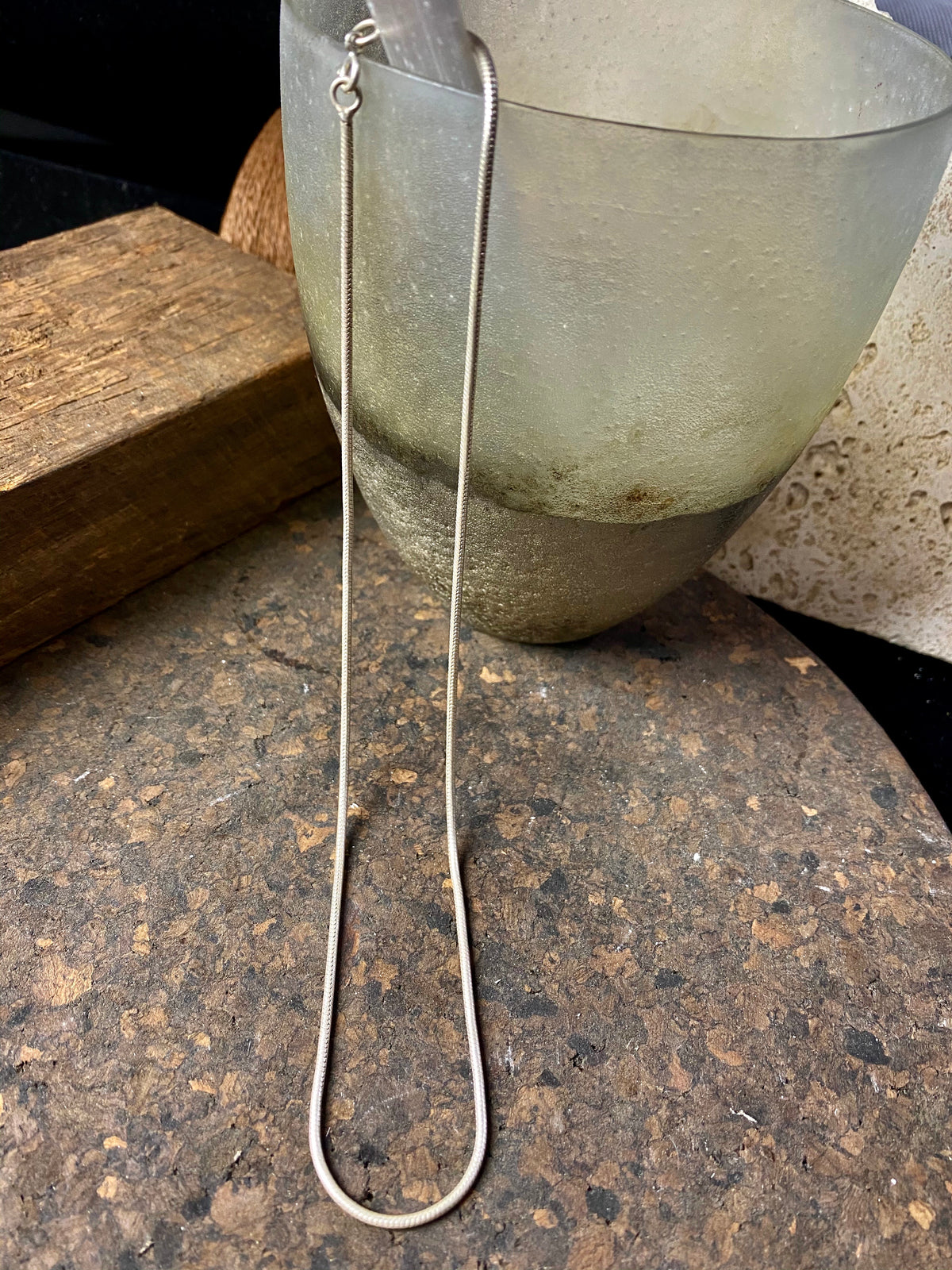 fine sterling silver snake chain is densely woven and strong, with a bright silver finish and ring clasp