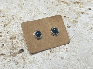 Simple and elegant, these small black onyx earring studs are hand made from sterling silver and set with onyx cabochons