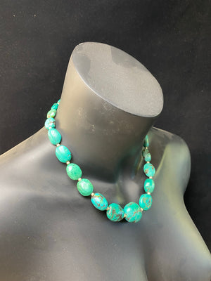 Stunning natural turquoise necklace featuring sterling silver beads and fastening. A unique tribal inspired necklace with a luxurious Boho vibe Measurements: 44 cm length including clasp