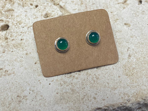 Small chrysoprase earring studs are hand made from sterling silver and set with clear green chrysoprase cabochons. A unisex earring