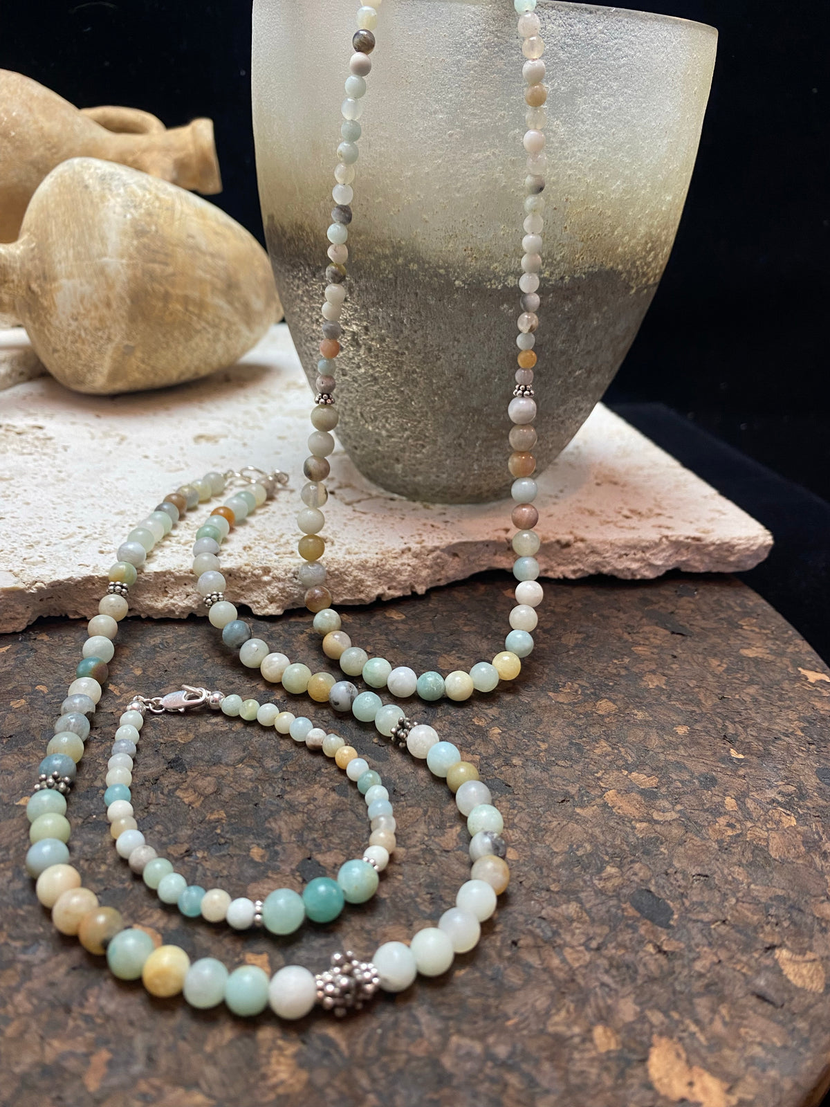 Glowing natural pastel hued graduated quartz beads teamed with sterling silver feature beads and findings